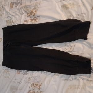 Dark grey sweatpants.